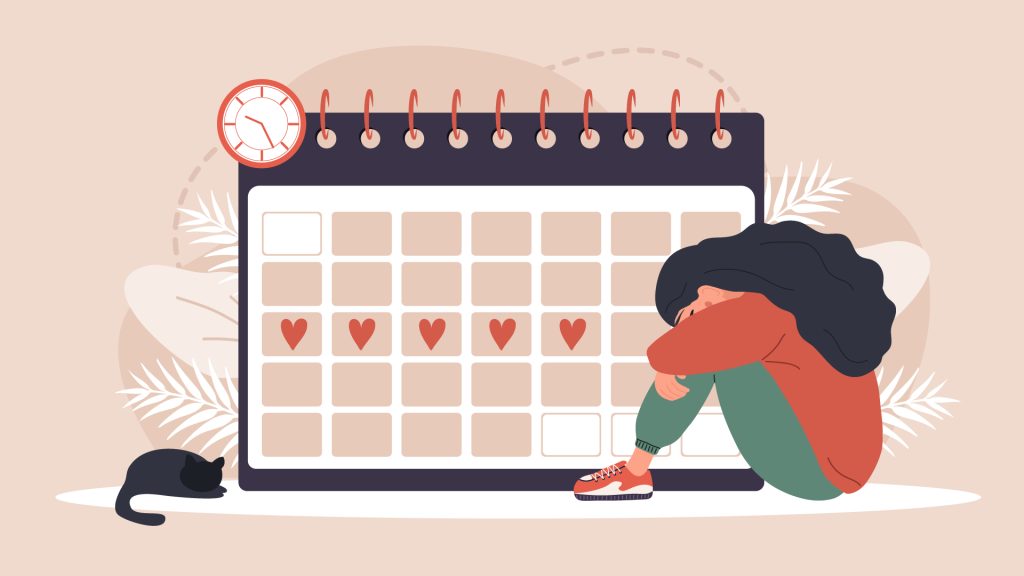 女性坐在標記經期的月曆前情緒低落,呈現月經期間不適與經血過多對生活與情緒的影響